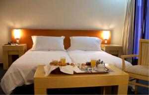 Cama o camas de una habitación en Dorian Inn