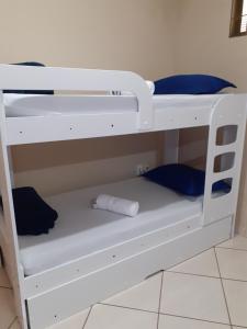 Cama ou camas em um quarto em Divino Lugar