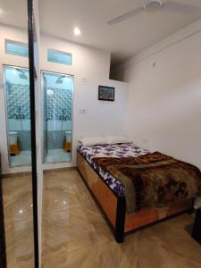 Letto o letti in una camera di Varah Square Guest House