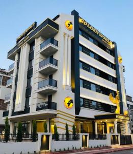 a building with pumpkin faces on the front of it at Golden World Suite Hotel in Antalya