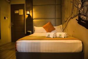 Postel nebo postele na pokoji v ubytování Dy Viajero Transient Hotel + 7 fotografií