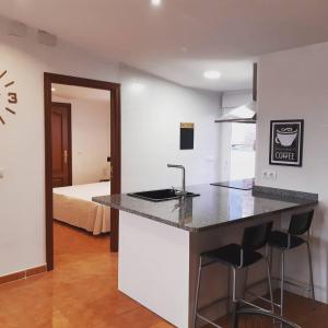 Postel nebo postele na pokoji v ubytování Hostal El Rincon de la Vera