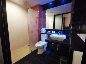 Koupelna v ubytování Mandy Nok Hotel