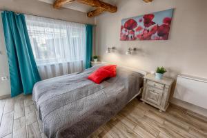Posteľ alebo postele v izbe v ubytovaní Caesar Apartments & Rooms