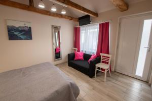 Posteľ alebo postele v izbe v ubytovaní Caesar Apartments & Rooms