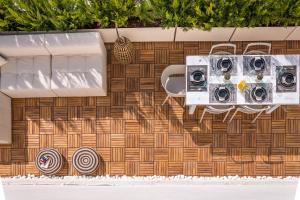 Fotografia z galérie ubytovania Shapes Luxury Suites v destinácii Ermoupoli