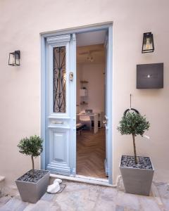 Posteľ alebo postele v izbe v ubytovaní Shapes Luxury Suites