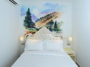 Postel nebo postele na pokoji v ubytování Hotel de Art USJ 21