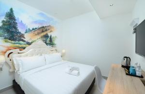 Postel nebo postele na pokoji v ubytování Hotel de Art USJ 21