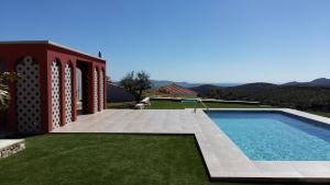 The swimming pool at or close to Villa Nefeli