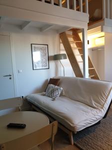 A bed or beds in a room at Casa do Museu, Museum House