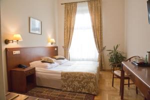 Posteľ alebo postele v izbe v ubytovaní Hotel Polonia
