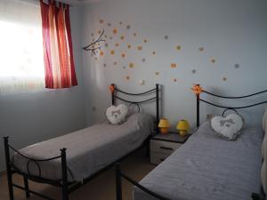 A bed or beds in a room at Villa Nefeli