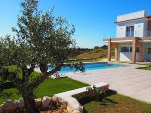 The swimming pool at or close to Villa Nefeli