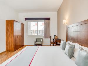 Una cama o camas en una habitación de Hotel Quinta Allende