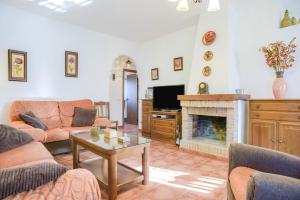 Televízia a/alebo spoločenská miestnosť v ubytovaní Casa Villanueva 5 - Sólo Familias