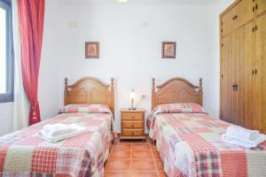 Posteľ alebo postele v izbe v ubytovaní Casa Villanueva 5 - Sólo Familias