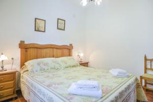 Posteľ alebo postele v izbe v ubytovaní Casa Villanueva 5 - Sólo Familias
