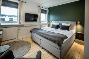 Postel nebo postele na pokoji v ubytování Hotel Sidesporet