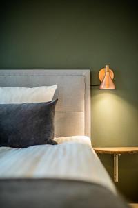Postel nebo postele na pokoji v ubytování Hotel Sidesporet