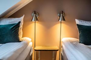 Postel nebo postele na pokoji v ubytování Hotel Sidesporet