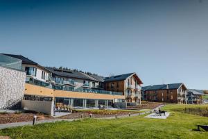 a view of a campus with buildings at Lake Hill Karkonosze Resort & Spa in Sosnówka