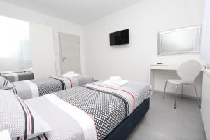 Postel nebo postele na pokoji v ubytování Apartment Karlo 1