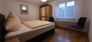 Postel nebo postele na pokoji v ubytování Ferienwohnung am Junkerbült