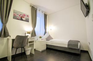 Hotel L201 - 24h self-check in客房内的一张或多张床位