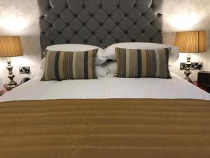 Loftsome Bridge Hotel客房内的一张或多张床位