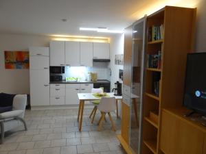 Kjøkken eller kjøkkenkrok på Beautiful Apartment im Zentrum von Sankt Augustin mit Netflix-Anschluss