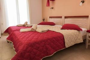 Postel nebo postele na pokoji v ubytování Maistrali