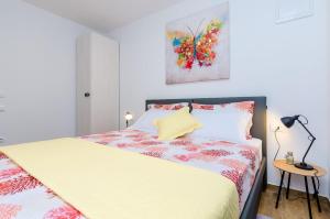 Postel nebo postele na pokoji v ubytování Apartment Moon River