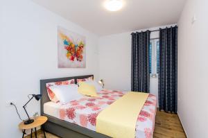 Postel nebo postele na pokoji v ubytování Apartment Moon River