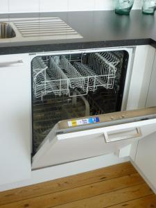 Kuchyň nebo kuchyňský kout v ubytování Apartment casuaLLoft
