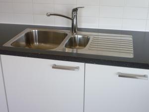 Η κουζίνα ή μικρή κουζίνα στο Apartment casuaLLoft