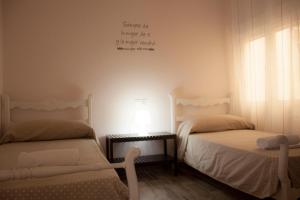 A bed or beds in a room at Apartamento Nuevo con Encanto