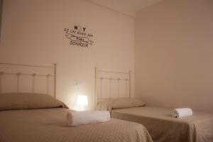 A bed or beds in a room at Apartamento Nuevo con Encanto