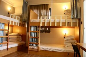 Postel nebo postele na pokoji v ubytování Travel light hostel