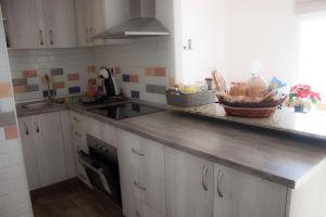 A kitchen or kitchenette at Apartamento Nuevo con Encanto