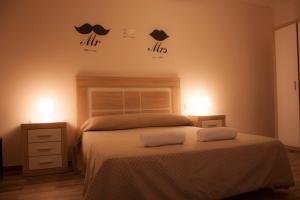 A bed or beds in a room at Apartamento Nuevo con Encanto