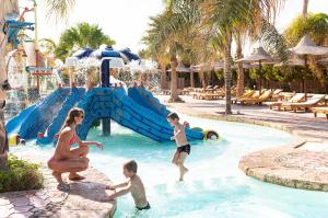 The swimming pool at or close to Three Corners Sea Beach Resort
