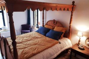 Postel nebo postele na pokoji v ubytování affouage