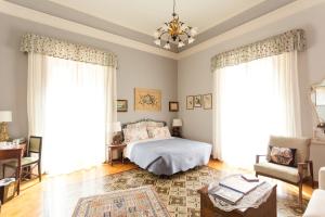 Postel nebo postele na pokoji v ubytování Crociferi B&B