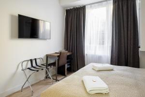 Televisyen dan/atau pusat hiburan di B&B Galleria Cavour
