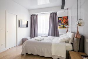 Katil atau katil-katil dalam bilik di B&B Galleria Cavour +104 gambar