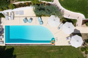 Bazén v ubytování Akti Elia Villas Beachfront Chalkidiki nebo v jeho okolí