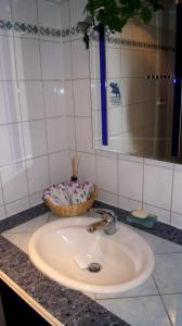 Koupelna v ubytování Gästewohnung am Thümmlitzwald