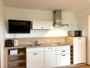 Kuchyň nebo kuchyňský kout v ubytování Gästehaus Seeklause