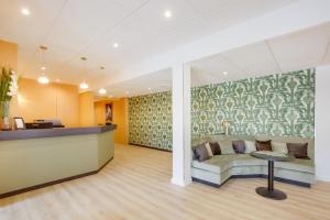 Posezení v ubytování Zenith Hotel Caen